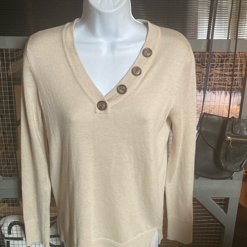 Tan sweater…Pink Clover brand size small